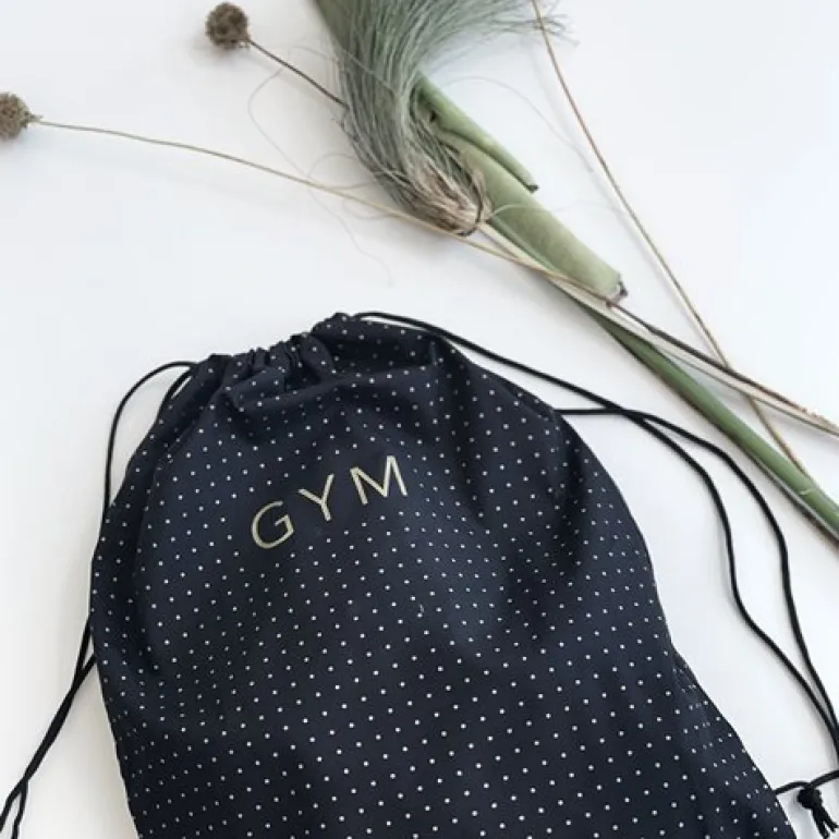 Gymnastikpose sort med guldtryk - GYM